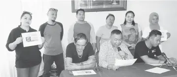  ??  ?? Zulbadiar (seated, centre), flanked by Radin on his right and Ibrahim, makes the announceme­nt at the press conference.