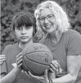  ?? POSTMEDIA NEWS ?? Summer Dauz learned her basketball skills with Ausome Ottawa, a nine-year-old recreation­al sports program. Her mother, Nicole Dauz, says sports is typically about competing, but this was “just about having fun.”