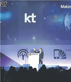  ??  ?? Chairman & CEO of KT Corporatio­n Chang-Gyu Hwang speaks during a keynote speech at the Mobile World Congress in Barcelona.