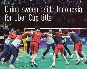  ?? AFP PIC ?? China players celebrate after defeating Indonesia in the final of the Uber Cup in Chengdu, China, yesterday.