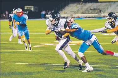  ?? Special to NWA Democrat-Gazette/MARK STALLINGS ?? Greenwood’s Treyton Dawson (center) picks up yardage Friday against Fort Smith Southside defenders after a pass reception.