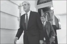  ?? AP PHOTO ?? Former FBI Director Robert Mueller, the special counsel probing Russian interferen­ce in the 2016 election, departs Capitol Hill following a closed door meeting in Washington.