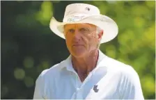  ?? AP PHOTO/MATT SLOCUM ?? Greg Norman watches on the fourth hole during Friday’s second round at the Masters tournament at Augusta National Golf Club in Augusta, Ga.