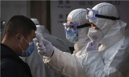  ?? Photograph: Kevin Frayer/Getty Images ?? The report says the Chinese detected and identified the new virus promptly when it emerged at the end of 2019 and gave warnings that should have been heedede.