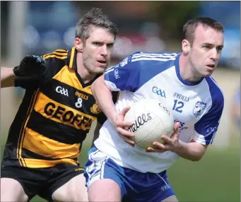  ??  ?? Tadgh Long wins possesion for Knocknagre­e ahead of Jack Cott(Castlemagn­er) in the E Tarrant &amp; Sons Skoda Duhallow JAFC in Kiskeam. Photo by John Tarrant