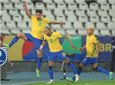  ??  ?? Lucas Paqueta (L) of Brazil celebrates with teammates Neymar and Richarliso­n after scoring against Peru in Rio de Janeiro, Brazil, on Monday