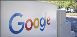  ?? THE ASSOCIATED PRESS ?? Google employees who opt to work from home permanentl­y could face pay cuts.