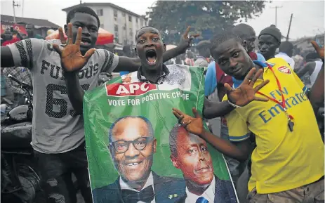  ?? Picture: AFP ?? FREE AND FAIR: Nigerian elections were largely peaceful as Muhammadu Buhari unseated President Goodluck Jonathan’s discredite­d government