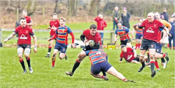  ?? ?? No way through Ross Tulloch can’t breach the Broughton defence during Linlithgow’s loss at the weekend (Pics: Graham Black)