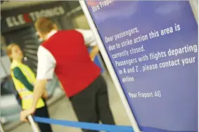  ??  ?? KAI PFAFFENBAC­H/REUTERS Passengers walk at the airport as public traffic is closed due to German public sector workers’ union Verdi strikes in demand for higher wages in Frankfurt, Germany on April 10, 2018.