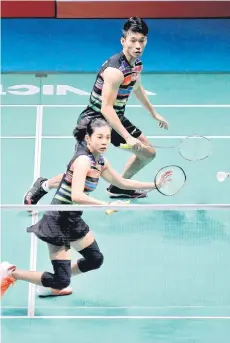  ?? Bernama file photo — ?? Goh Liu Ying (left) and Chan Peng Soon play against Japan during the first round of Celcom Axiata Malaysian Open at Axiata Arena Bukit Jalil.