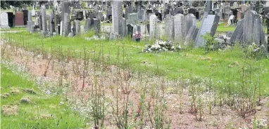  ??  ?? Eyesore Areas in Monklands, including cemeteries, had become overgrown with weeds