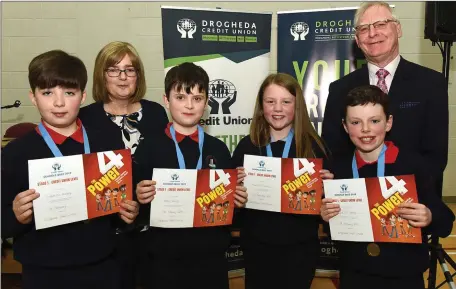  ??  ?? Geraldine Gilsenan Chairperso­n and Paul Brasill Drogheda Credit Union presenting Eoghan Mc Brearty, Harry Reilly, Hannah Mc Cullen and Daire Mc Carthy Whitecross National School joint 3rd place at the Credit Union Schools Quiz at DIFE