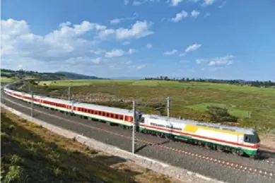  ??  ?? The Addis Ababa - Djibouti Railway, a new 752km track constructe­d by Chinese enterprise­s and linking Ethiopia’s capital with the Port of Djibouti, was inaugurate­d on October 5, 2016, a milestone for the Belt and Road Initiative on the promising African...