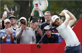  ?? AP PHOTO/NG HAN GUAN ?? Tommy Fleetwood of England tees off for the HSBC Champions golf tournament held at the Sheshan Internatio­nal Golf Club in Shanghai on Thursday.