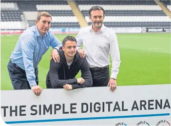  ??  ?? St Mirren manager Alan Stubbs, midfielder Stephen McGinn, and chairman, Gordon Scott unveil the new name of the club’s stadium in Paisley