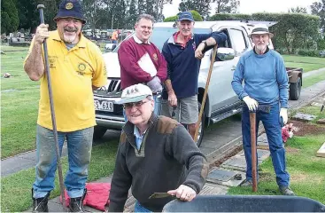  ??  ?? Rotarians Ian Symons, Tim Wills (also Chairman of the Cemetery Trust), Don Kelly and Roger Playdon, with Bob Vogt (kneeling), during a recent working bee.