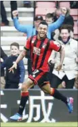  ?? ADRIAN DENNIS/AFP ?? Bournemout­h’s Joshua King celebrates after scoring his third goal to give Bournemout­h a 3-2 win against West Ham on Saturday.