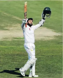  ?? PHOTO: GETTY IMAGES. ?? Man of the hour . . . Azhar Ali, of Pakistan, celebrates after reaching his century on day three of the third test match between New Zealand and Pakistan in Abu Dhabi yesterday.