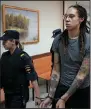  ?? (AP) ?? American basketball star Brittney Griner is escorted from a courtroom in Khimki, Russia, on Aug. 4. She is serving a nine-year prison sentence for drug possession in a penal colony in Mordovia.