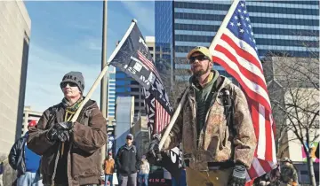  ??  ?? Supporters of President Donald Trump gather during a demonstrat­ion at Legislativ­e Plaza in Nashville on Wednesday. The demonstrat­ion was in opposition to Presidente­lect Joe Biden’s Electoral College victory in the 2020 election.