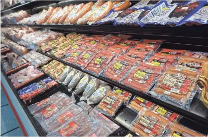  ?? PHOTOS BY DOMINIC ARMATO/THE REPUBLIC ?? The refrigerat­or case at Midwestern Meats boasts a huge selection of quality hot dogs.