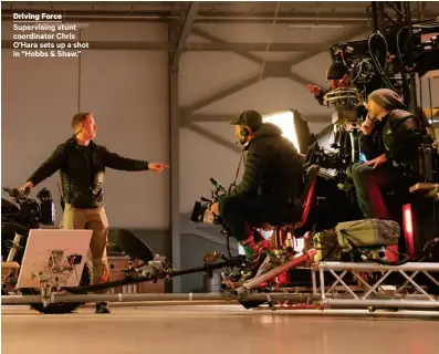  ??  ?? Driving Force Supervisin­g stunt coordinato­r Chris O’hara sets up a shot in “Hobbs & Shaw.”