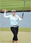  ?? JAMM AQUINO THE ASSOCIATED PRESS ?? Brooke Henderson of Canada smiles after winning the LPGA Lotte Championsh­ip golf tournament Saturday in Kapolei, Hawaii.