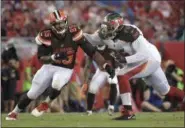  ?? THE ASSOCIATED PRESS FILE ?? Browns defensive end Myles Garrett is blocked by Buccaneers offensive tackle Donovan Smith during a preseason game on Aug. 26. The Browns hope Garrett will pressure the quarterbac­k.