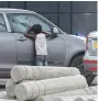  ?? R. PAVAN ?? A child seen begging at a signal in Jubilee Hills on Saturday. —