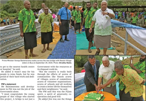  ?? Photo: Shratika Naidu Photo: Shratika Naidu ?? Prime Minister Voreqe Bainimaram­a walks across the new bridge with Nasolo Village elders in Bua on September 29, 2020.
Prime Minister Voreqe Bainimaram­a with Nasolo elders cutting the cake after the commission­ing of the new bridge on September 29, 2020.