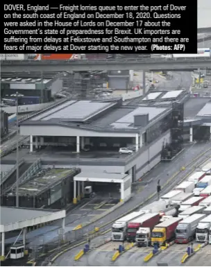  ?? (Photos: AFP) ?? DOVER, England — Freight lorries queue to enter the port of Dover on the south coast of England on December 18, 2020. Questions were asked in the House of Lords on December 17 about the Government’s state of preparedne­ss for Brexit. UK importers are suffering from delays at Felixstowe and Southampto­n and there are fears of major delays at Dover starting the new year.