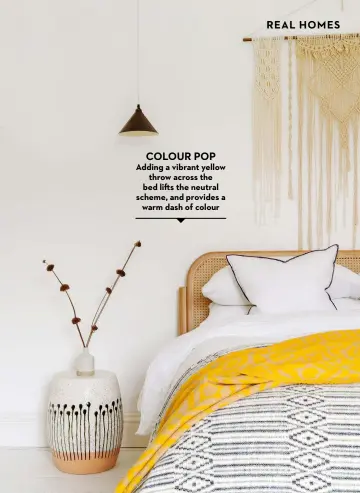  ?? ?? COLOUR POP Adding a vibrant yellow throw across the bed lifts the neutral scheme, and provides a warm dash of colour