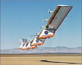  ?? NASA / Getty Images ?? HELIOS, an aircraft made by Monrovia tech company AeroVironm­ent, is tested in 1999. The vehicle broke a world record for sustained level flight two years later.