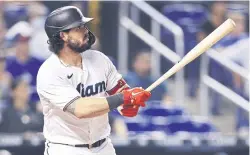  ?? AFP ?? Jorge Alfaro of the Miami Marlins hits a go-ahead solo home run.