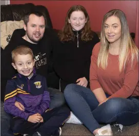  ??  ?? Tommy Kinsella (7) with his parents Gary and Nóirín and sister Katelyn.