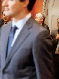  ??  ?? Wilson-Raybould (le ) and Philpott look on during Trudeau’s cabinet shuffle in January