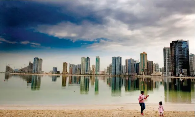  ?? Kamal Kassim/gulf Today ?? ↑
A picturesqu­e view of the Sharjah skyline on Thursday.