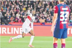  ?? — AFP photo ?? Paris Saint-Germain’s Dembele celebrates after scoring his team’s first goal.