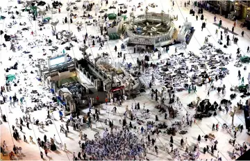  ??  ?? Pilgrims gather for prayers at the Grand Mosque in Mecca ahead of the start of the annual Haj pilgrimage. — AFP photo