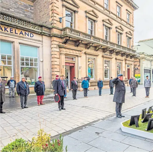  ??  ?? REMEMBRANC­E: The laying of wreaths at the new war memorial at St John’s Kirk, Perth. Picture: Steve MacDougall.