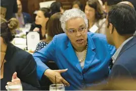  ?? ERIN HOOLEY/CHICAGO TRIBUNE ?? Cook County Board President Toni Preckwinkl­e, shown Sept. 28 in Chicago, has pledged to continue the cash handouts after the initial two-year run.