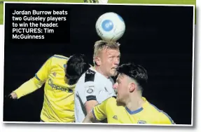  ??  ?? Jordan Burrow beats two Guiseley players to win the header. PICTURES: Tim McGuinness