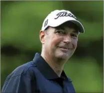  ?? JULIO CORTEZ — THE ASSOCIATED PRESS ?? David McNabb smiles on the fourth hole during the first round of the 2013 PGA Championsh­ip at Oak Hill Country Club in Pittsford, N.Y.