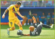 ?? FOTOS: AFP ?? MESSI X 2. Leo convirtió un gol y asistió a Luis Suárez.