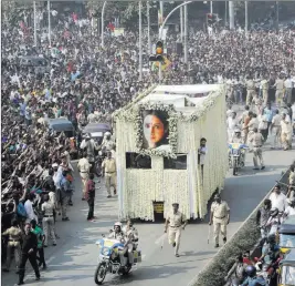  ?? Rajanish Kakade ?? The Associated Press The body of Indian actress Sridevi is carried in a truck during her funeral in Mumbai, India, on Wednesday. The iconic Bollywood actress drowned accidental­ly in a Dubai hotel bathtub over the weekend.
