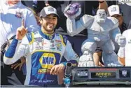  ?? JASON MINTO AP ?? Chase Elliott celebrates after snapping a 26-race winless streak with a victory at Dover, his 14th career Cup win.