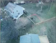  ?? SUBMITTED PHOTO ?? Overhead photo shows sinkhole that developed in yard of a West Whiteland home Sunday afternoon near the Mariner East pipeline.