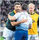  ?? Photo / Getty Images ?? Willie le Roux gives ref Nigel Owens a post-match hug.