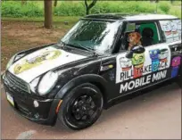  ?? SUBMITTED PHOTO ?? The Montgomery County Courthouse comfort dog tests out the interior of the new MINI. The mobile MINI comes at no cost to taxpayers and has been supported through donations.